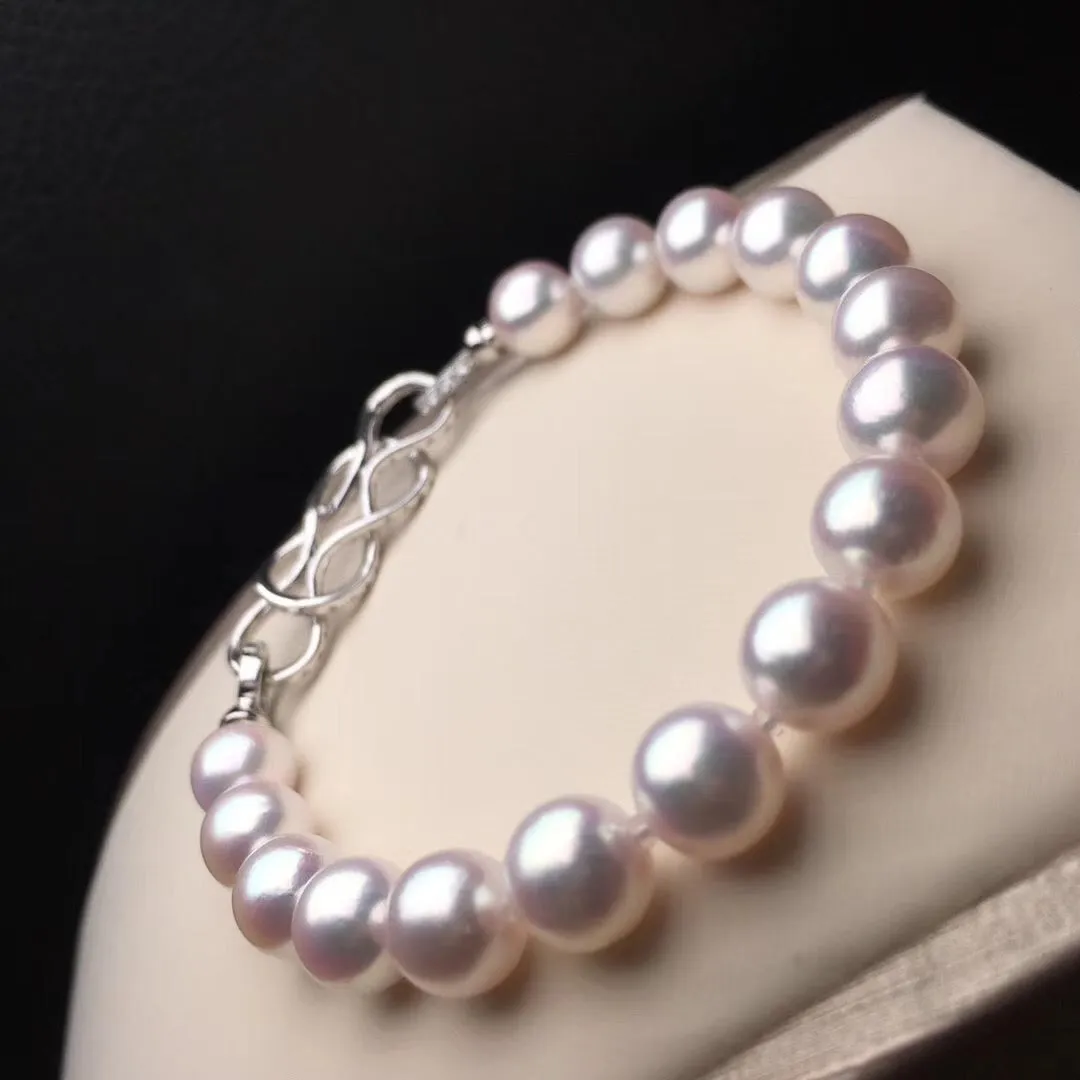 7.5-8.0 mm Near Gem White Akoya Pearl Bracelet & Diamond in 18K Gold Clasp