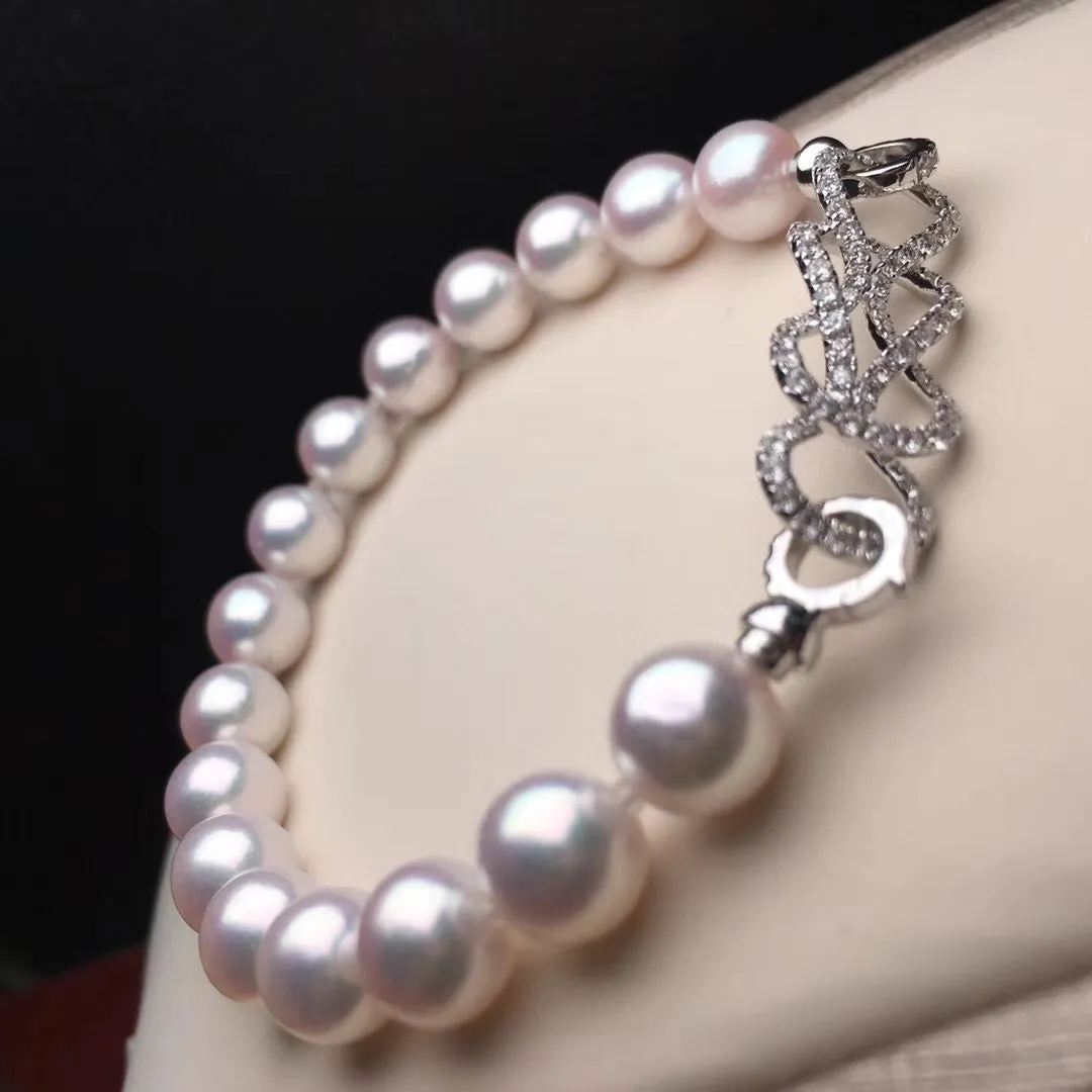 7.5-8.0 mm Near Gem White Akoya Pearl Bracelet & Diamond in 18K Gold Clasp